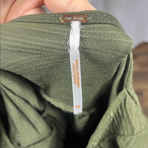 Free People Lily Violet Mini Dress in Olive Smoke. - Picture 9 of 11